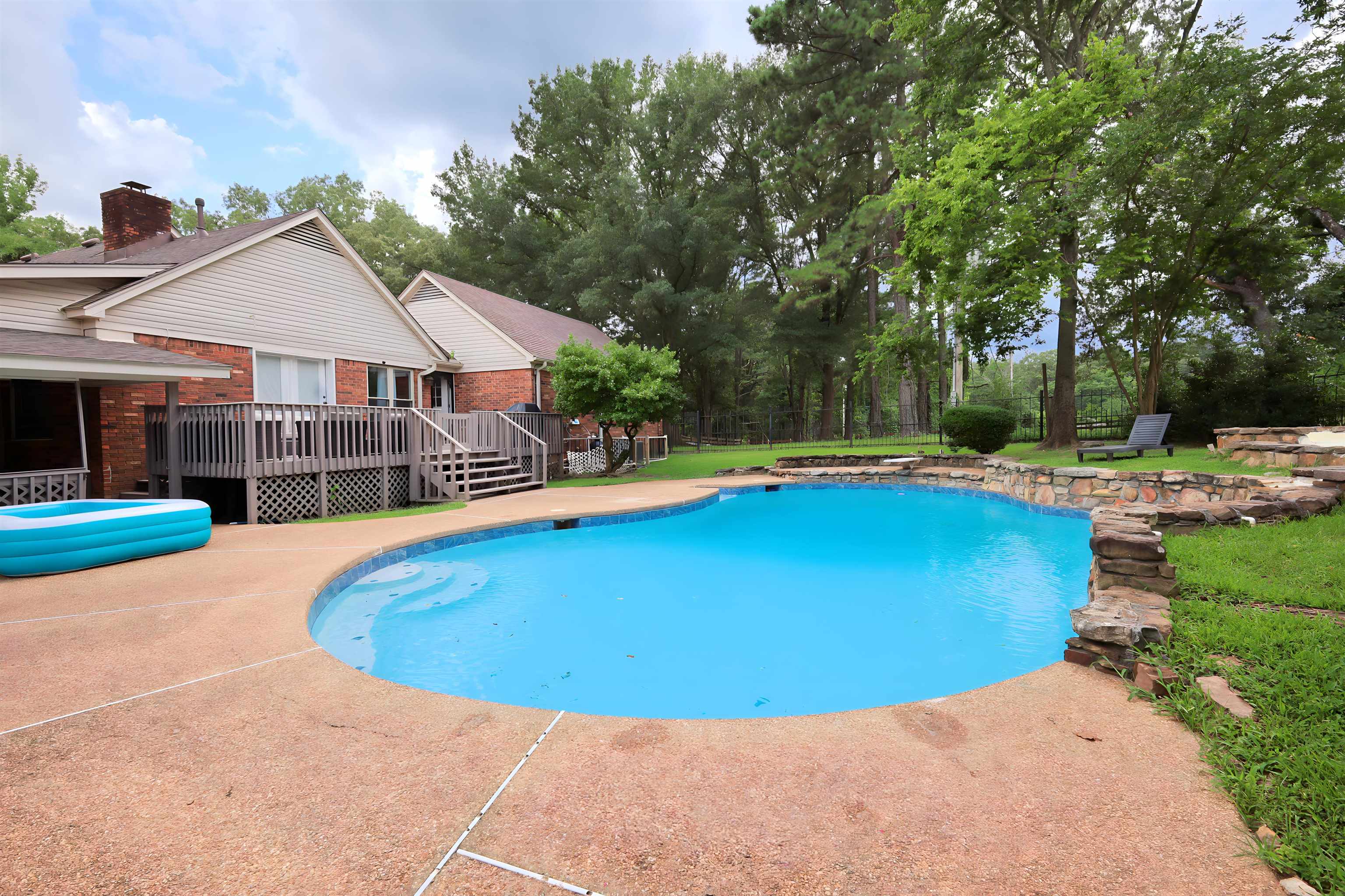 415 Key Road Collierville, TN 38017 - Photo 37 of 40 a view of a house with swimming pool and yard
