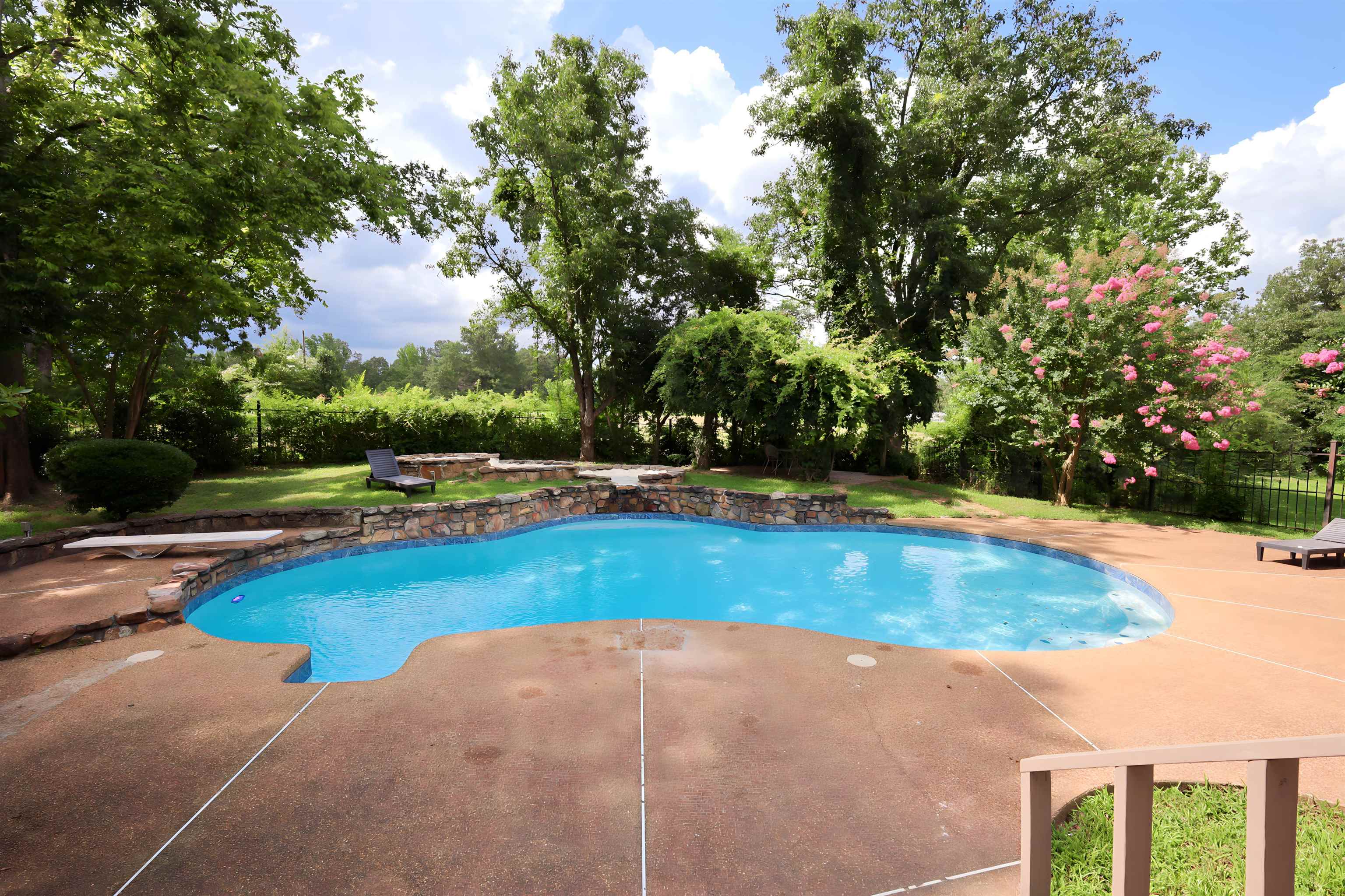 415 Key Road Collierville, TN 38017 - Photo 6 of 40 a view of a swimming pool and trees