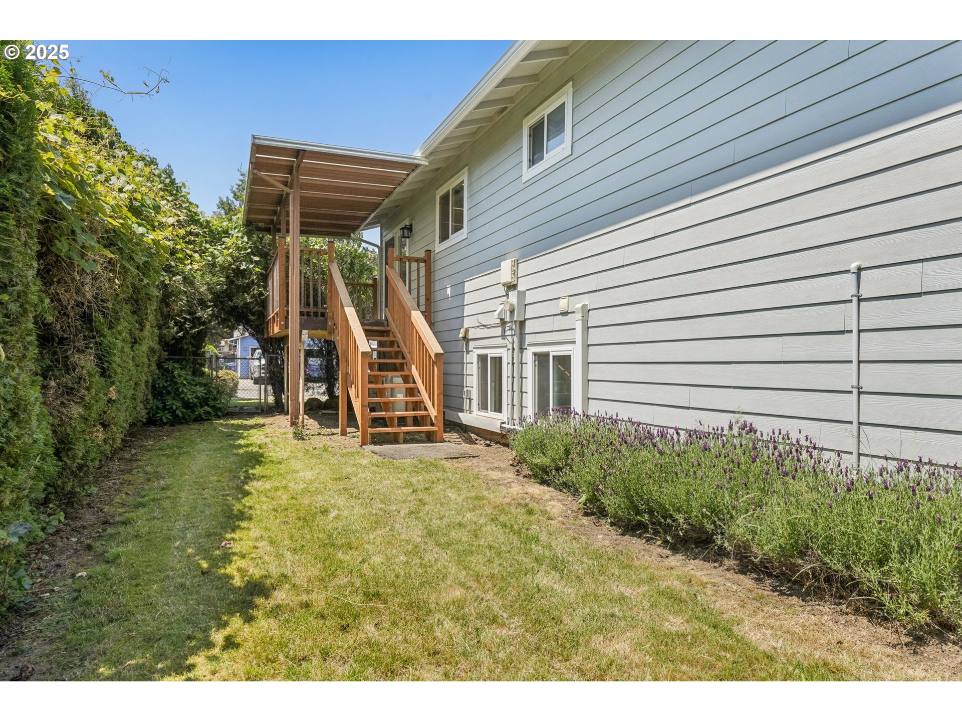 704 Southeast 207th Avenue Gresham, OR 97030 - Photo 26 of 35 a view of a backyard with plants and a patio