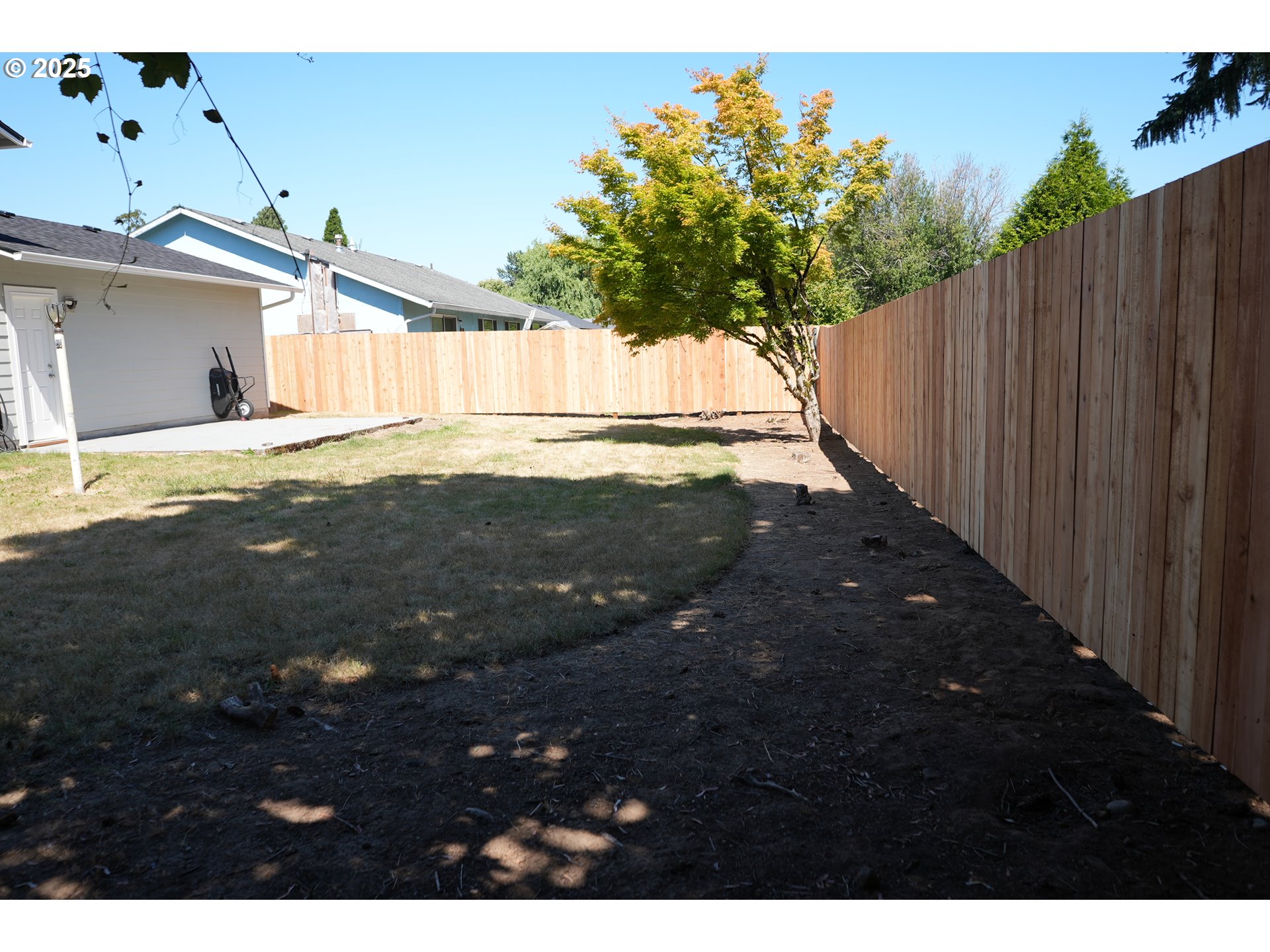704 Southeast 207th Avenue Gresham, OR 97030 - Photo 32 of 35 a view of a backyard of the house