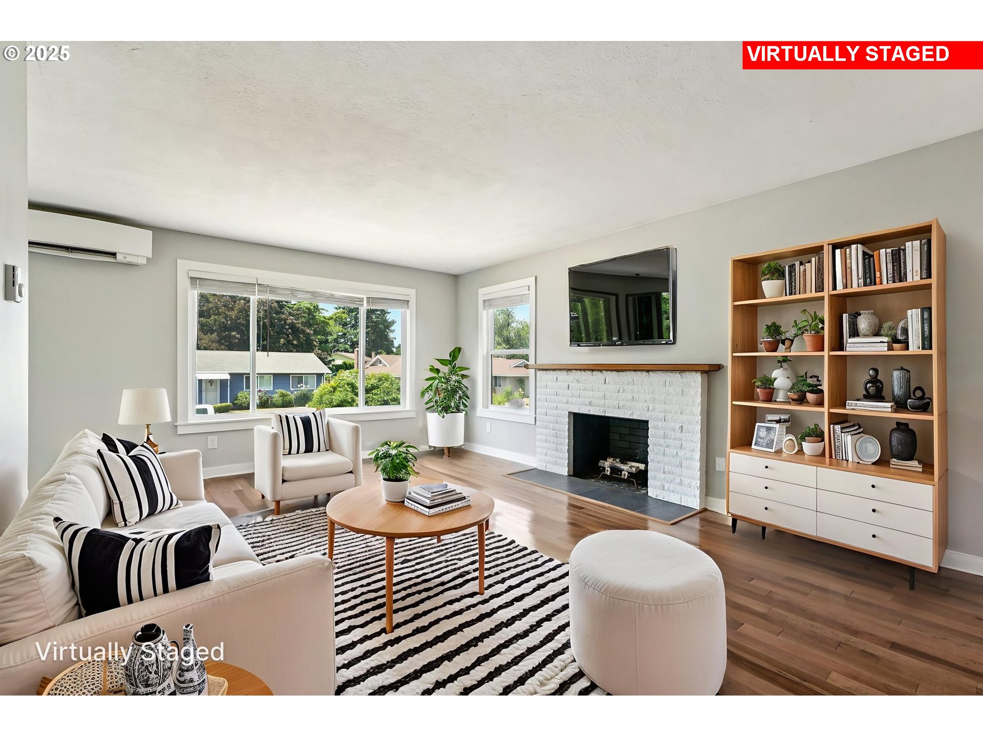 704 Southeast 207th Avenue Gresham, OR 97030 - Photo 7 of 35 a living room with furniture fireplace and flat screen tv