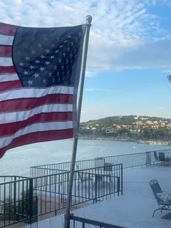 a view of a balcony with an ocean view
