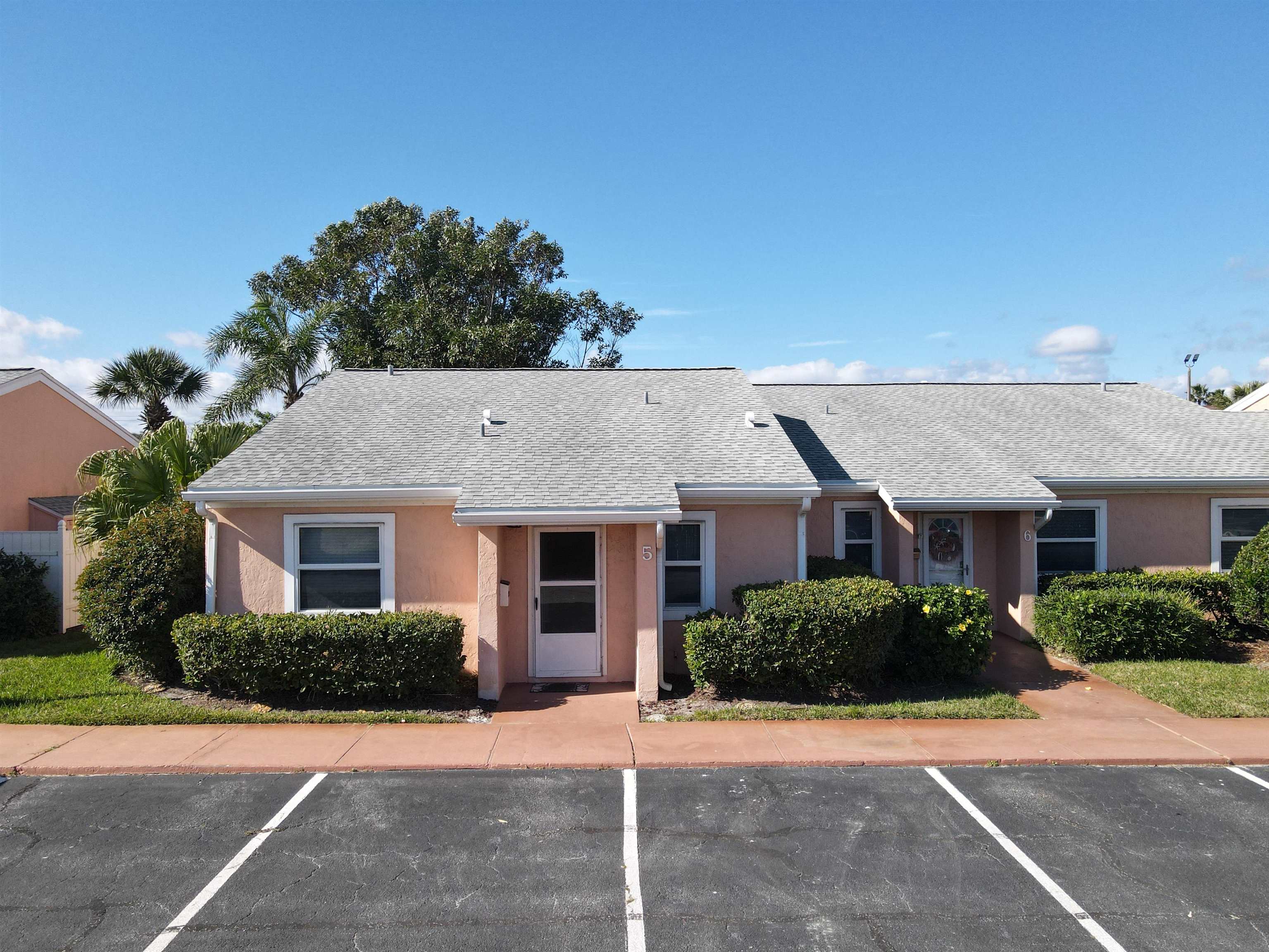 4 Ocean Trace Road, Unit 5 St. Augustine, FL 32080 - Photo 5 of 35 a house view with a outdoor space