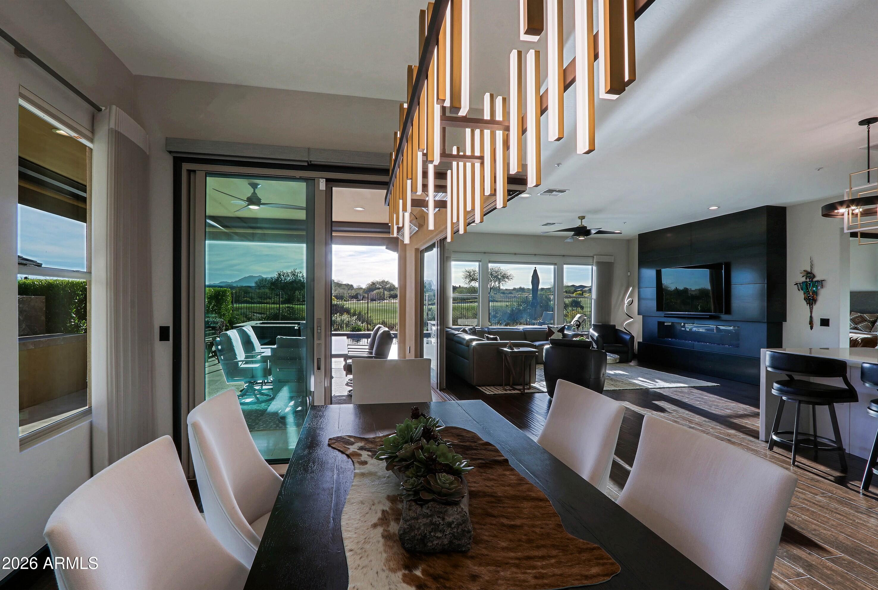 17623 East Fort Verde Road Rio Verde, AZ 85263 - Photo 16 of 57 a living room with furniture and a flat screen tv