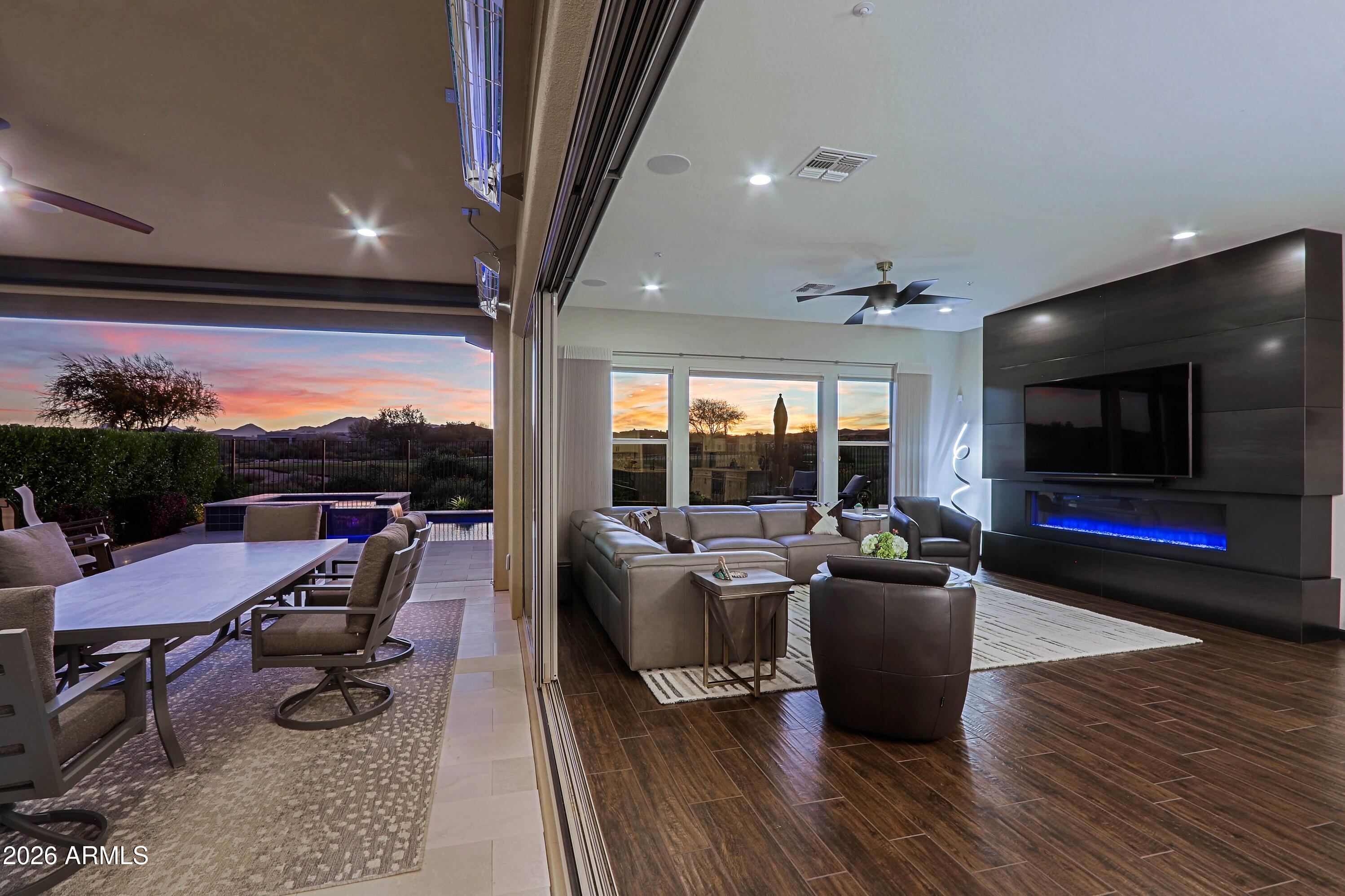 17623 East Fort Verde Road Rio Verde, AZ 85263 - Photo 19 of 57 a living room with furniture and a flat screen tv