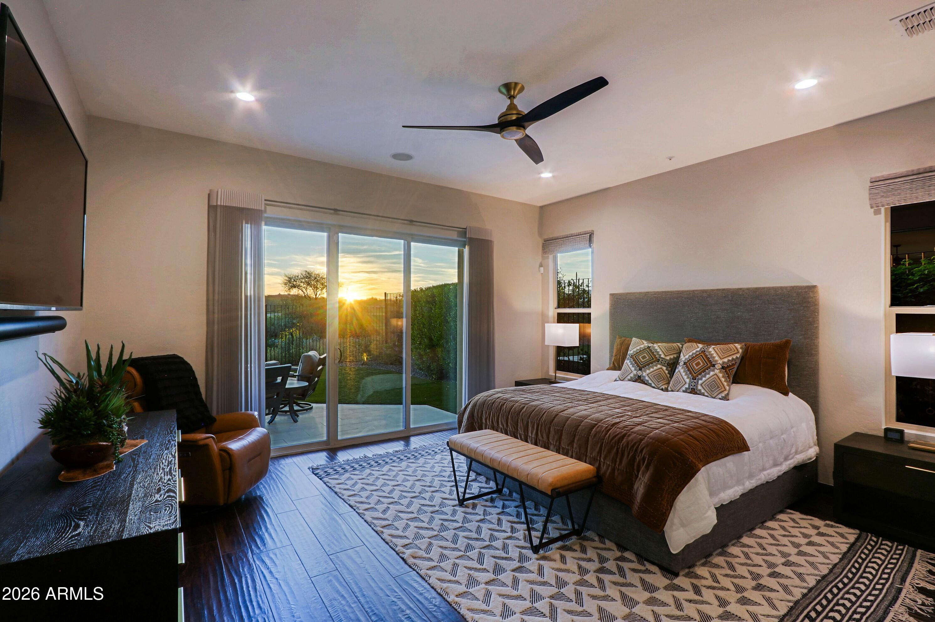 17623 East Fort Verde Road Rio Verde, AZ 85263 - Photo 26 of 57 a bedroom with a bed and a wooden floor