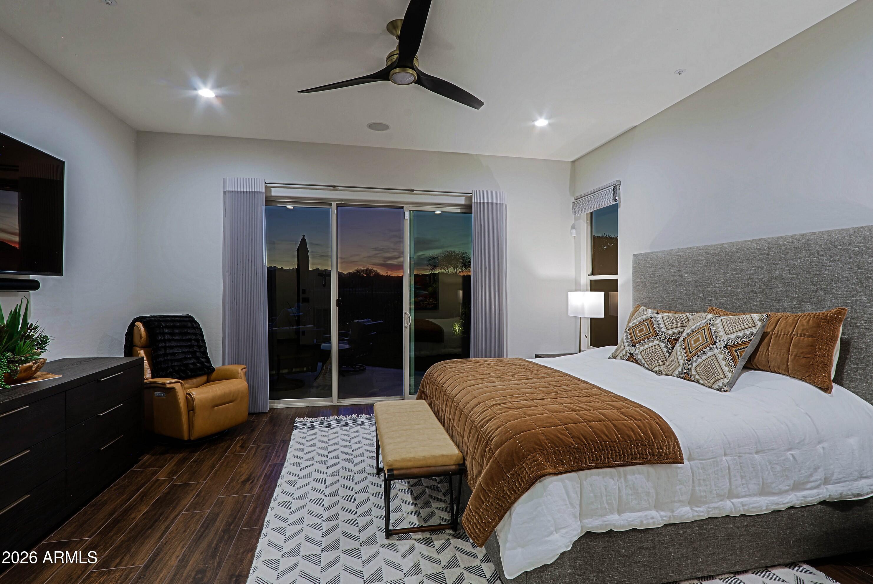 17623 East Fort Verde Road Rio Verde, AZ 85263 - Photo 27 of 57 a bedroom with a bed and a couch