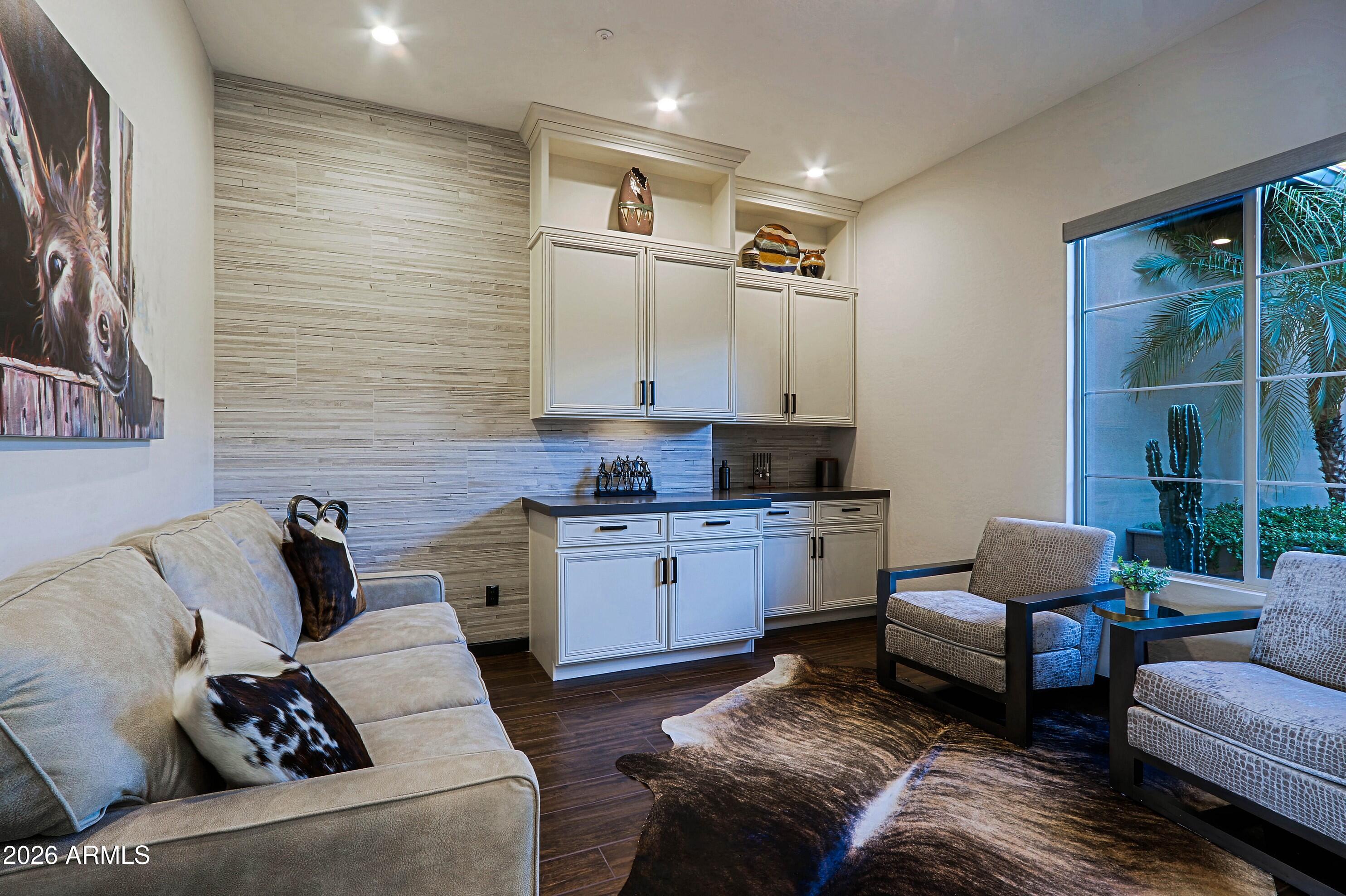 17623 East Fort Verde Road Rio Verde, AZ 85263 - Photo 32 of 57 a living room with furniture and a large window