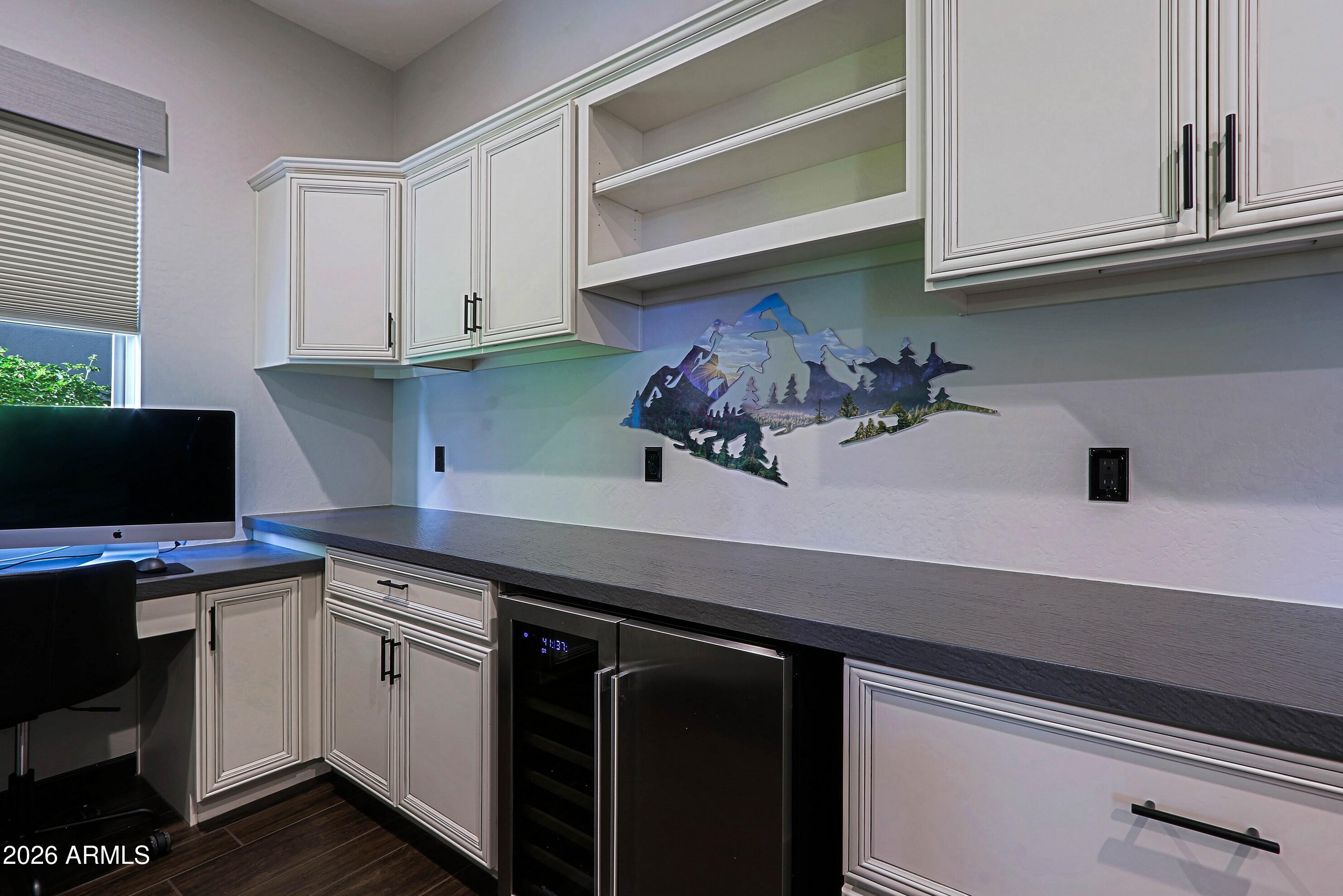 17623 East Fort Verde Road Rio Verde, AZ 85263 - Photo 47 of 57 a kitchen with stainless steel appliances a sink and cabinets