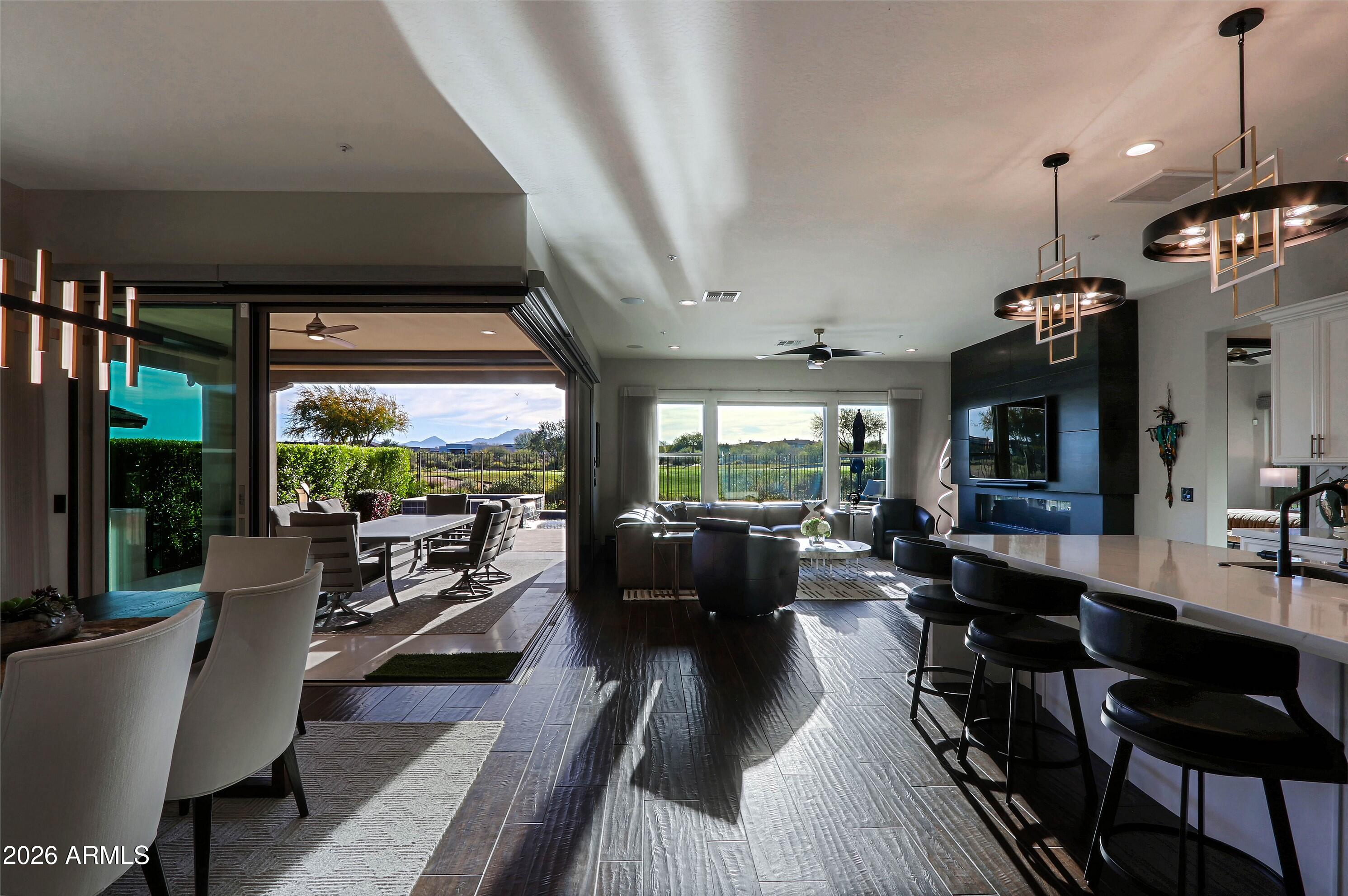17623 East Fort Verde Road Rio Verde, AZ 85263 - Photo 8 of 57 a living room with furniture a window and wooden floor
