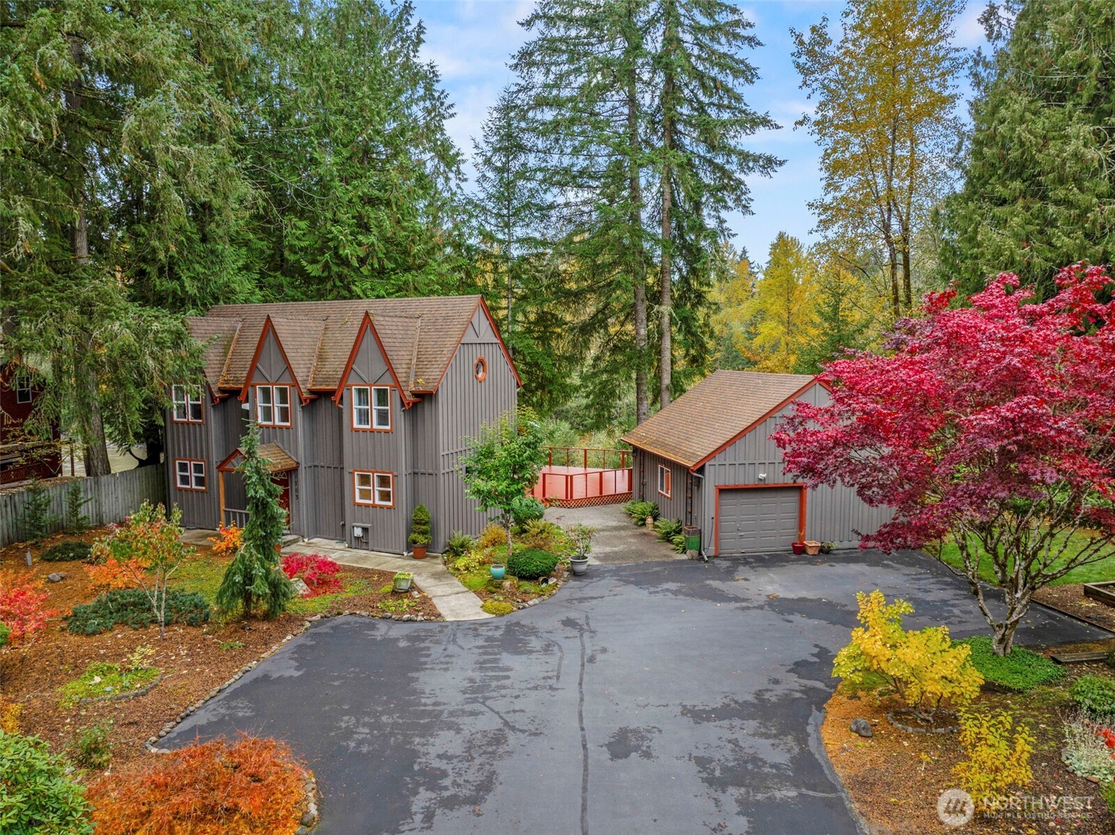 1703 Tower Road Castle Rock, WA 98611 - Photo 1 of 38 a view of a house with a small yard and a large tree