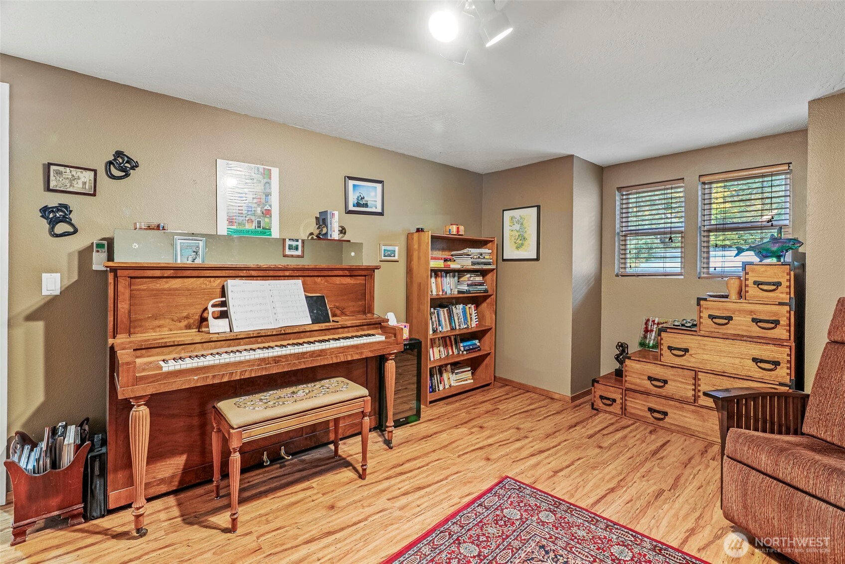 1703 Tower Road Castle Rock, WA 98611 - Photo 13 of 38 a living room with furniture and a wooden floor