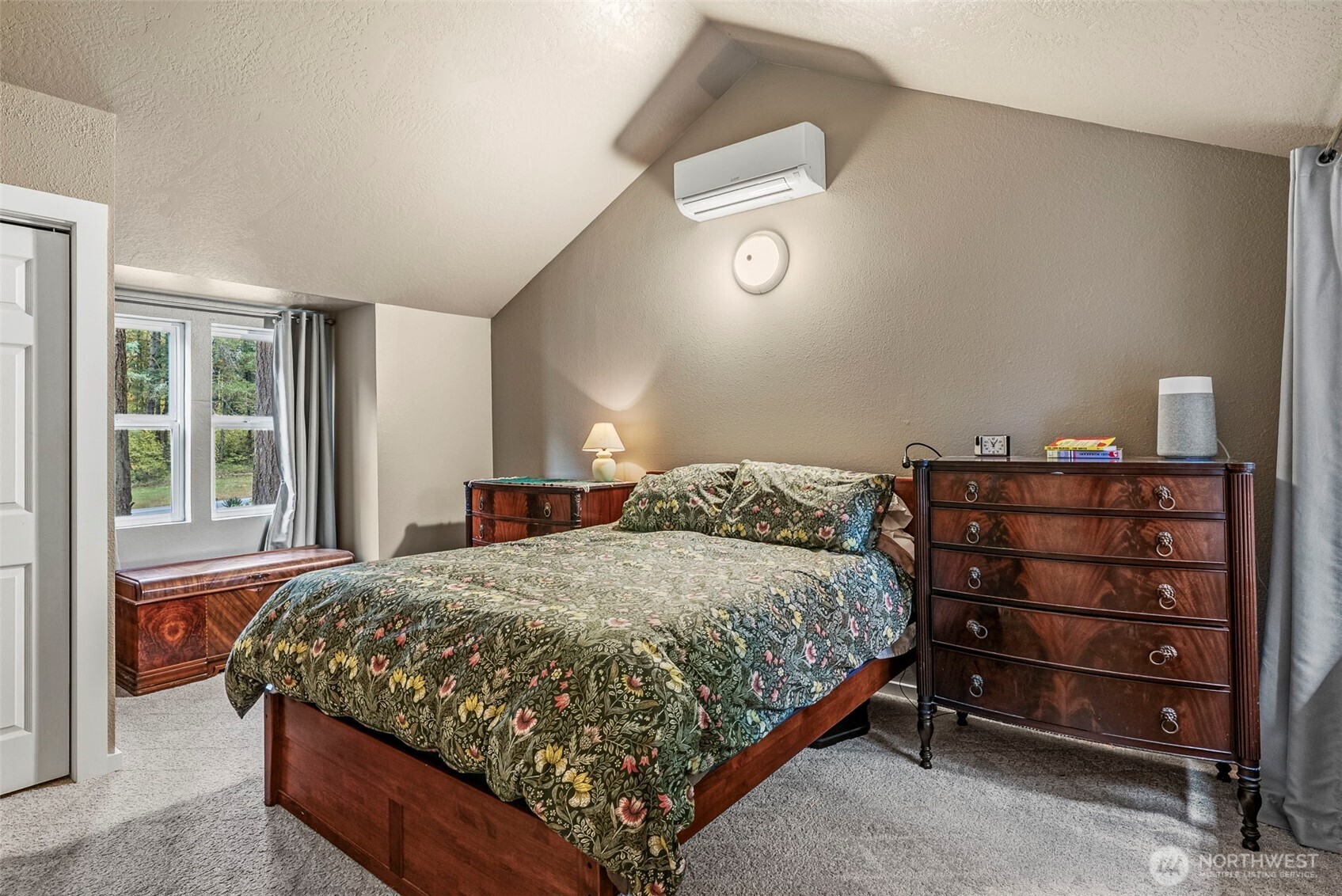 1703 Tower Road Castle Rock, WA 98611 - Photo 20 of 38 a bedroom with a bed and a window