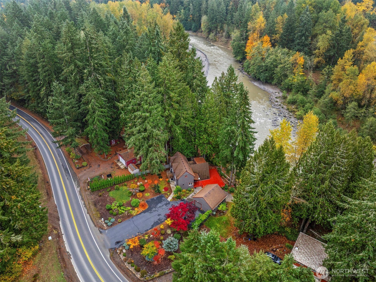 1703 Tower Road Castle Rock, WA 98611 - Photo 27 of 38 an aerial view of a house with a yard