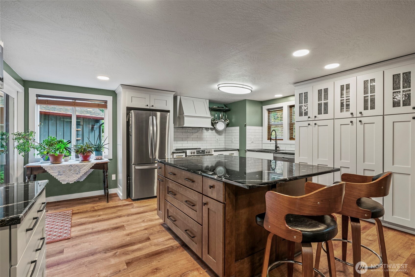 1703 Tower Road Castle Rock, WA 98611 - Photo 5 of 38 a kitchen with stainless steel appliances granite countertop a stove and a refrigerator