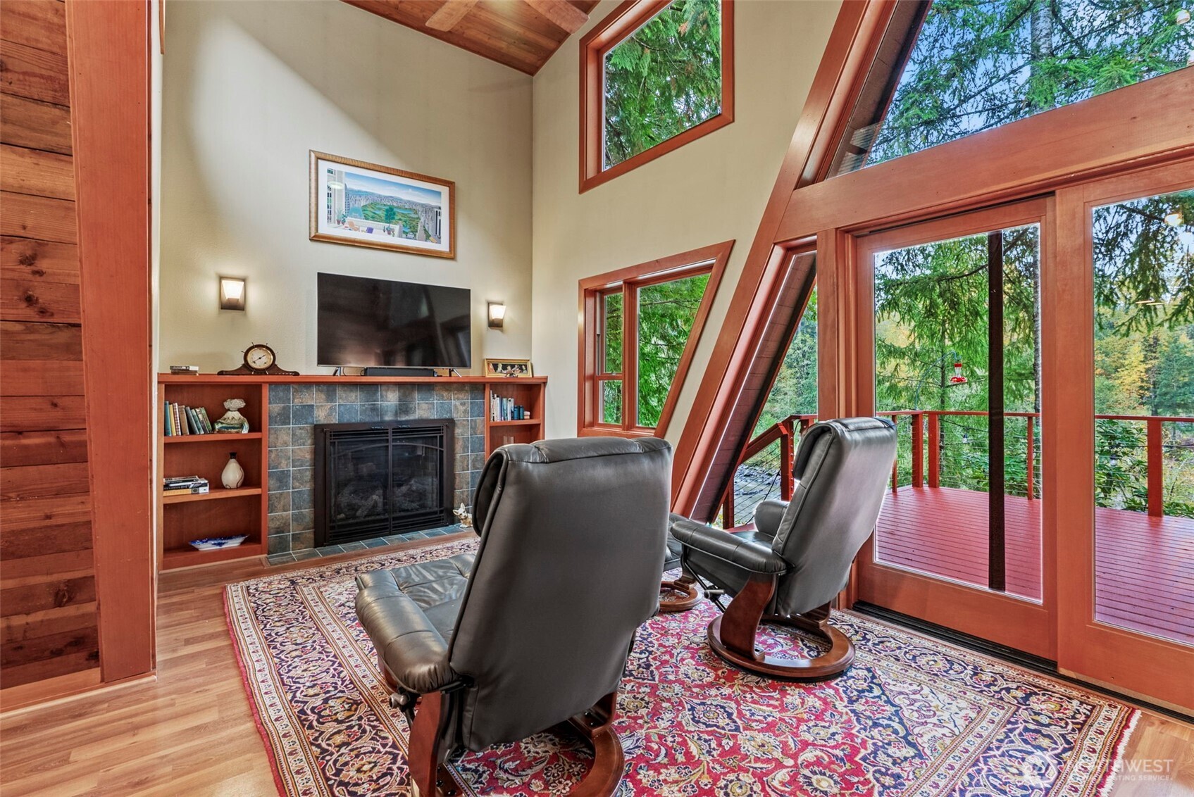 1703 Tower Road Castle Rock, WA 98611 - Photo 9 of 38 a view of a livingroom with furniture and a flat screen tv