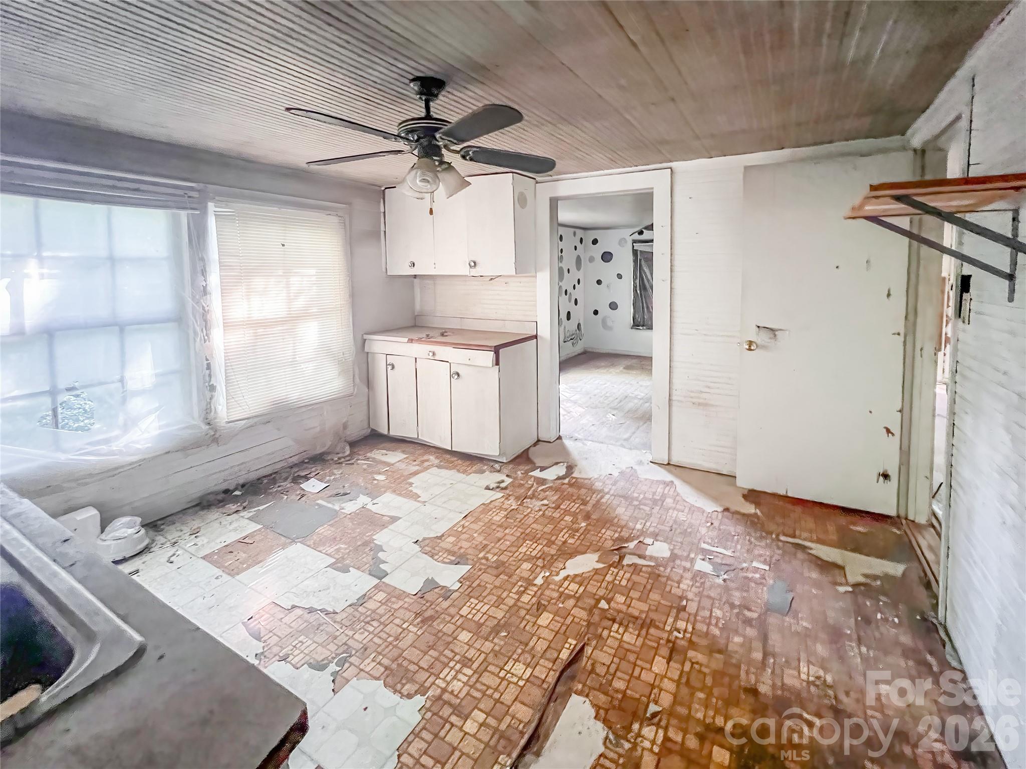122 Ranson Road Lancaster, SC 29720 - Photo 7 of 19 a view of a kitchen with a sink and cabinets