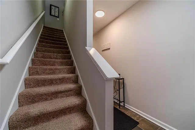 a bathroom with a toilet and a sink