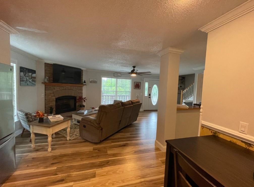 40D Kuvasz Weg, Unit B Helen, GA 30545 - Photo 2 of 12 a living room with furniture and a fireplace