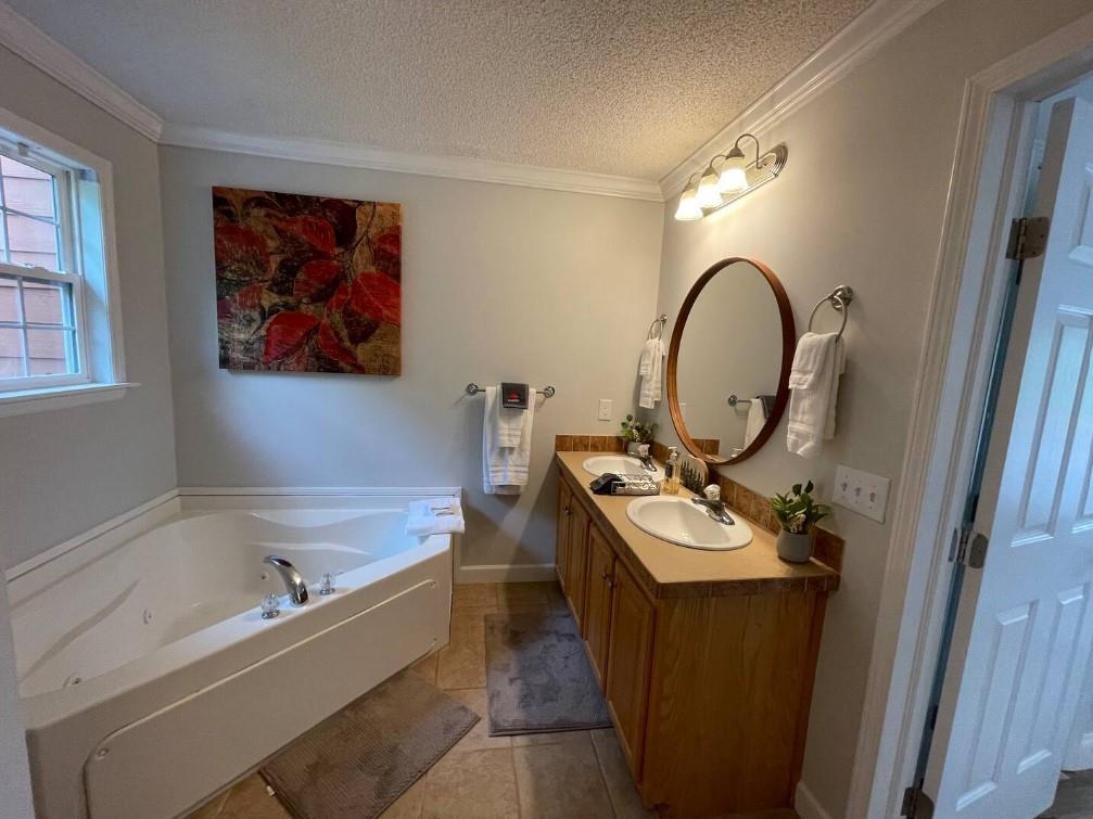 40D Kuvasz Weg, Unit B Helen, GA 30545 - Photo 10 of 12 a bathroom with a sink and a mirror