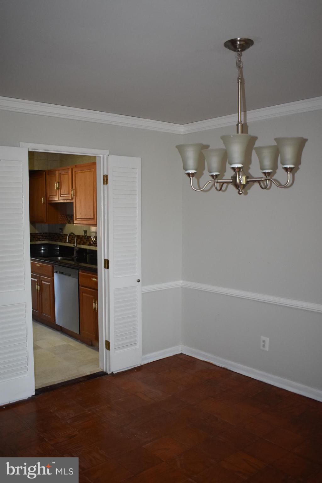 583 Summit Hall Road Gaithersburg, MD 20877 - Photo 10 of 52 L-shaped living and dining room