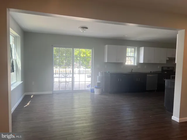 a view of kitchen and windows