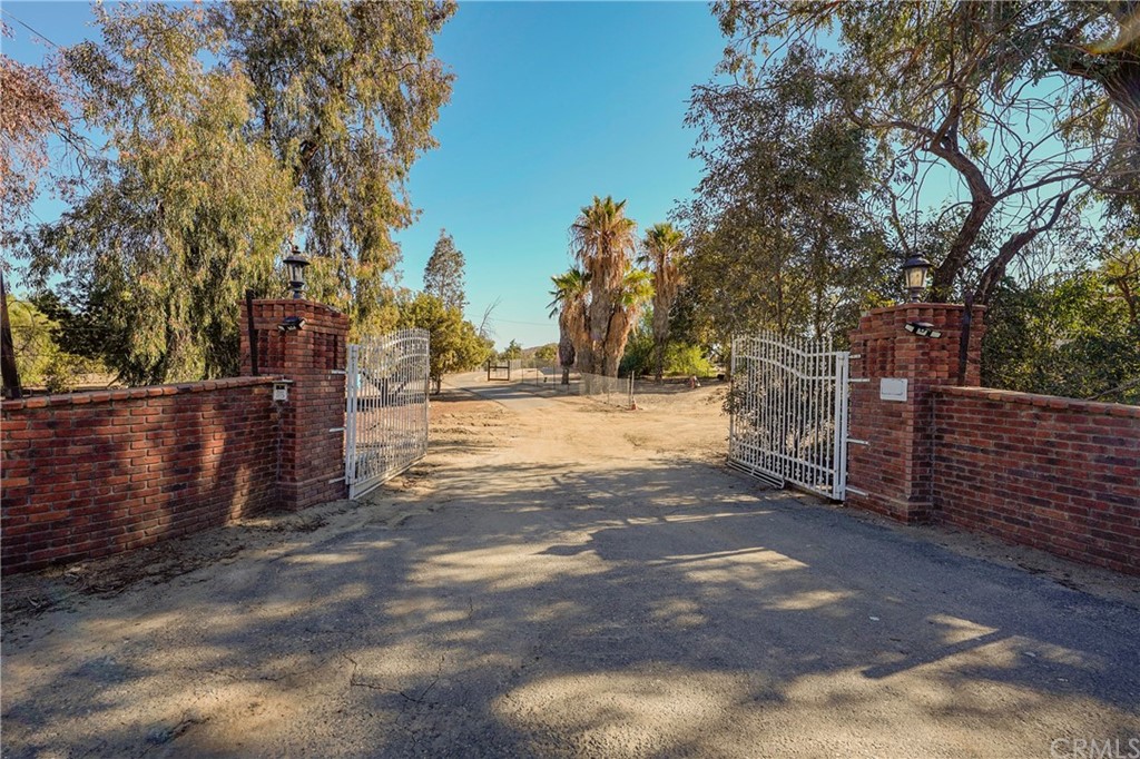 22186 Piedras Road Perris, CA 92570 - Photo 1 of 1 Front Entrance with gates