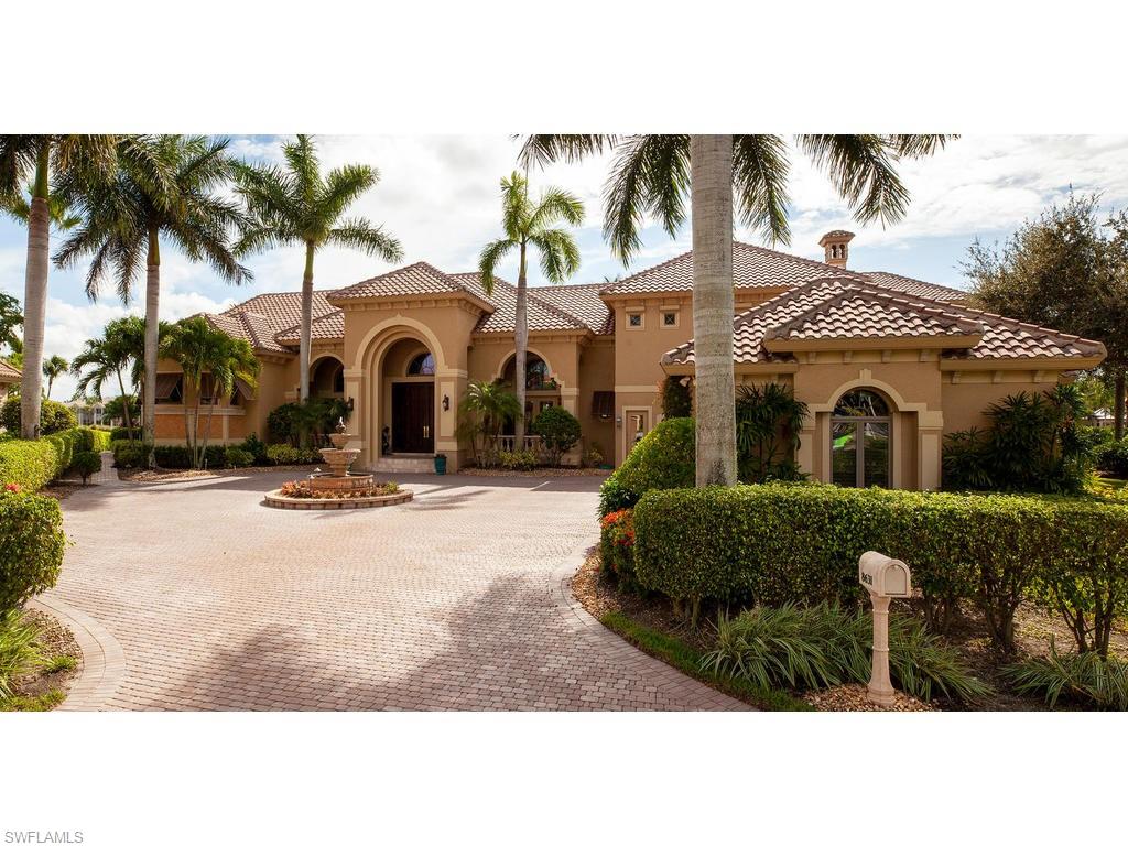 8631 Blue Flag Way Naples, FL 34109 - Photo 1 of 18 a front view of a house with a yard and garage