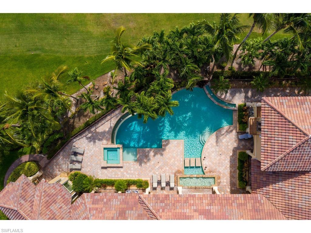 8631 Blue Flag Way Naples, FL 34109 - Photo 16 of 18 a view of a house with a yard