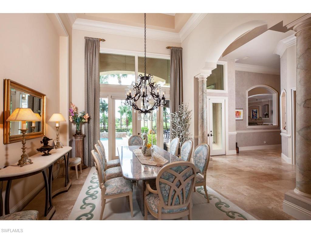 8631 Blue Flag Way Naples, FL 34109 - Photo 3 of 18 a view of a dining room with furniture window and wooden floor