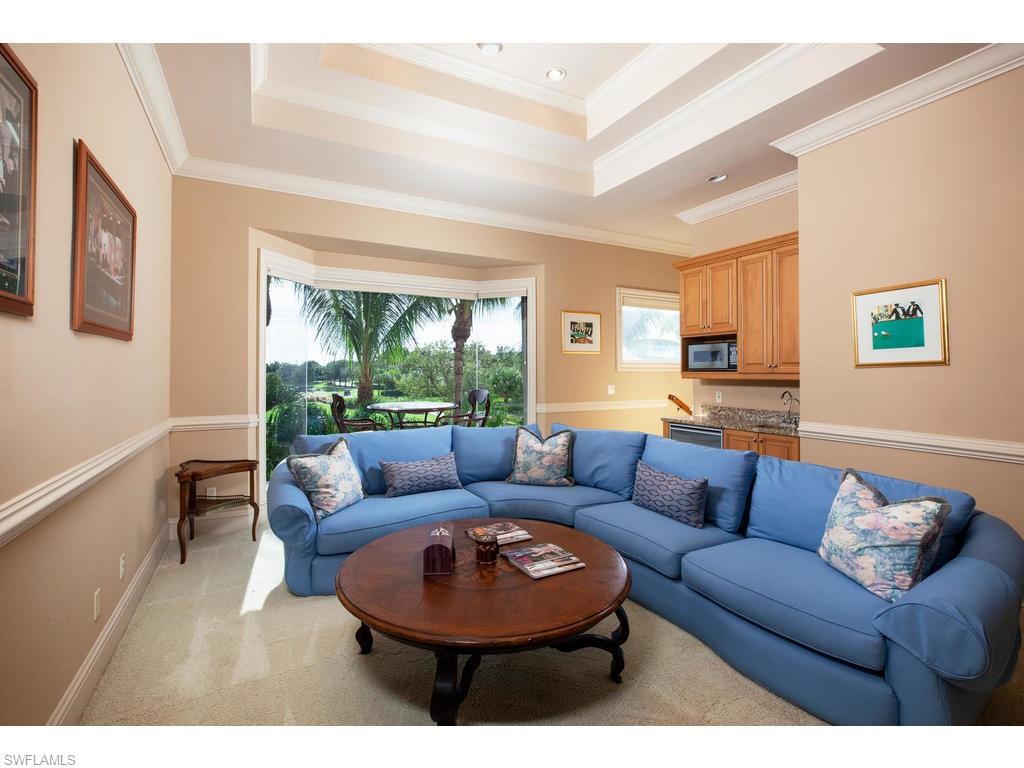 8631 Blue Flag Way Naples, FL 34109 - Photo 6 of 18 a living room with furniture and a large window