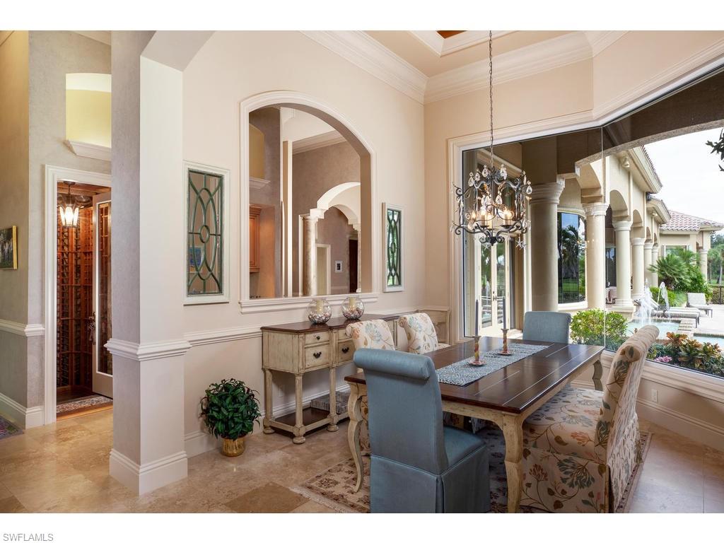 8631 Blue Flag Way Naples, FL 34109 - Photo 8 of 18 a living room with furniture and a large window