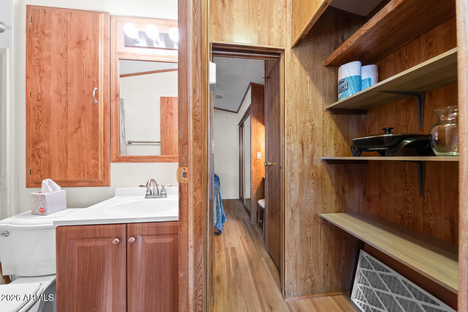 17200 West Bell Road, Unit 652 Surprise, AZ 85374 - Photo 14 of 19 a bathroom with a sink a toilet and shower