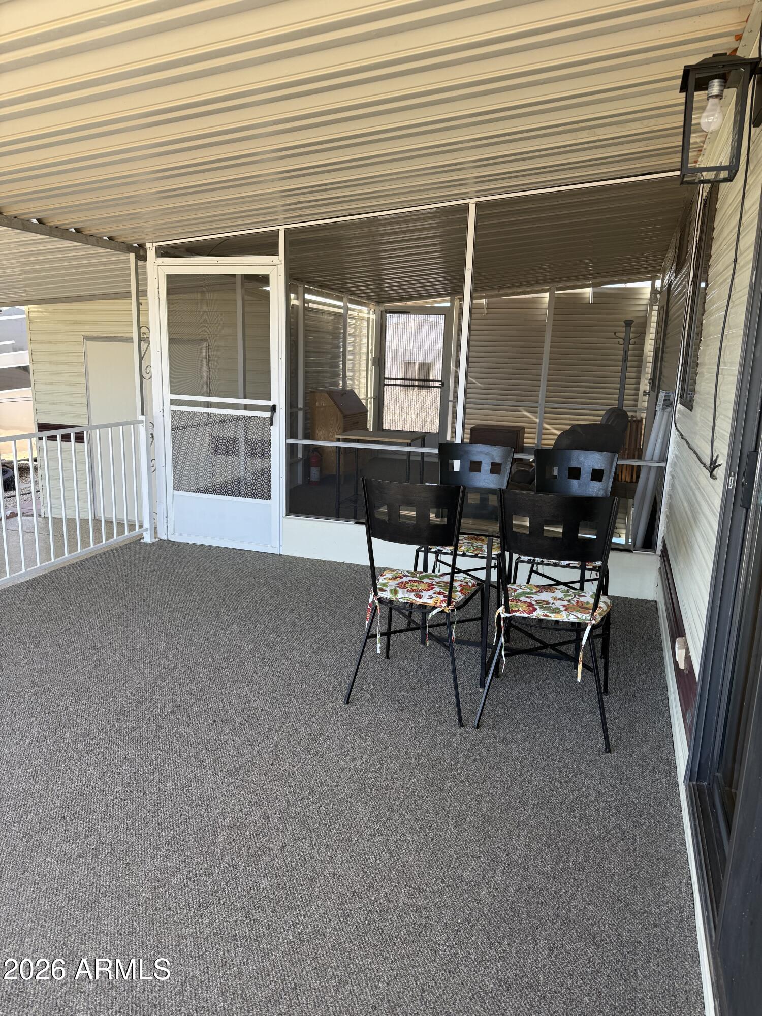 17200 West Bell Road, Unit 652 Surprise, AZ 85374 - Photo 2 of 5 a view of a workspace with furniture