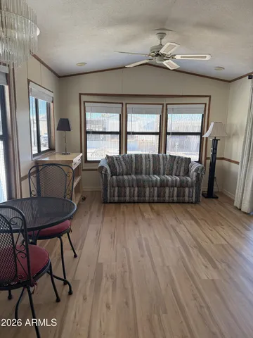 a living room with furniture and a window