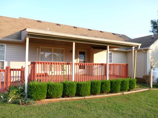 5538 Hunters Point Pike Lebanon, TN 37087 - Photo 19 of 20 a front view of a house with a garden and plants