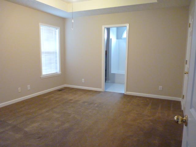 5538 Hunters Point Pike Lebanon, TN 37087 - Photo 7 of 20 an empty room with windows and closet