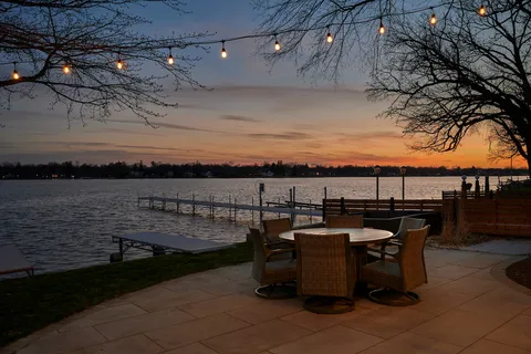 a view of a brick house with many windows