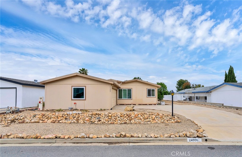 24800 Cornstalk Road Wildomar, CA 92595 - Photo 2 of 23 a view of a house with a pathway
