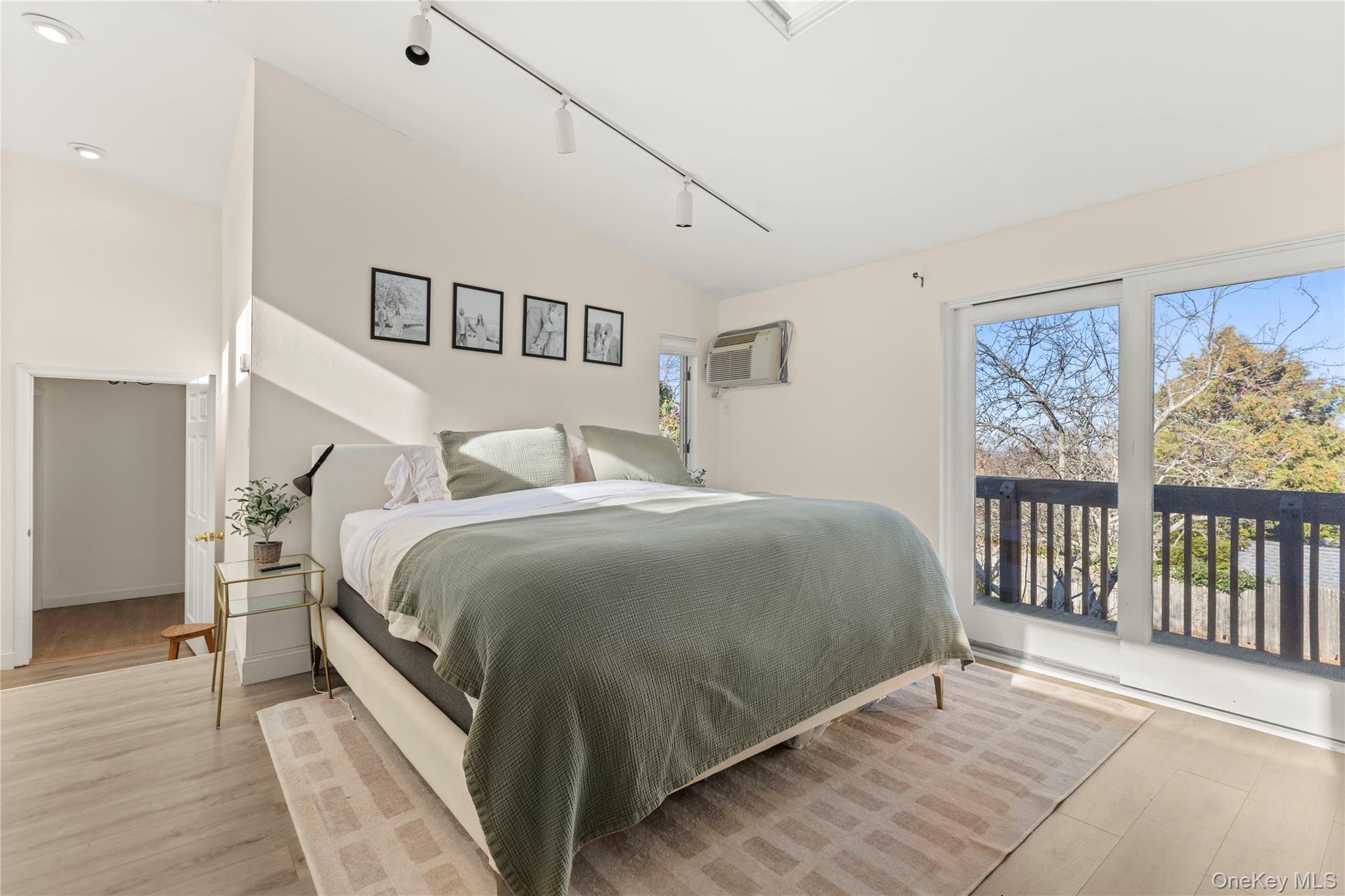 1 Tarn Road Rocky Point, NY 11778 - Photo 13 of 25 a bedroom with a large bed and a window