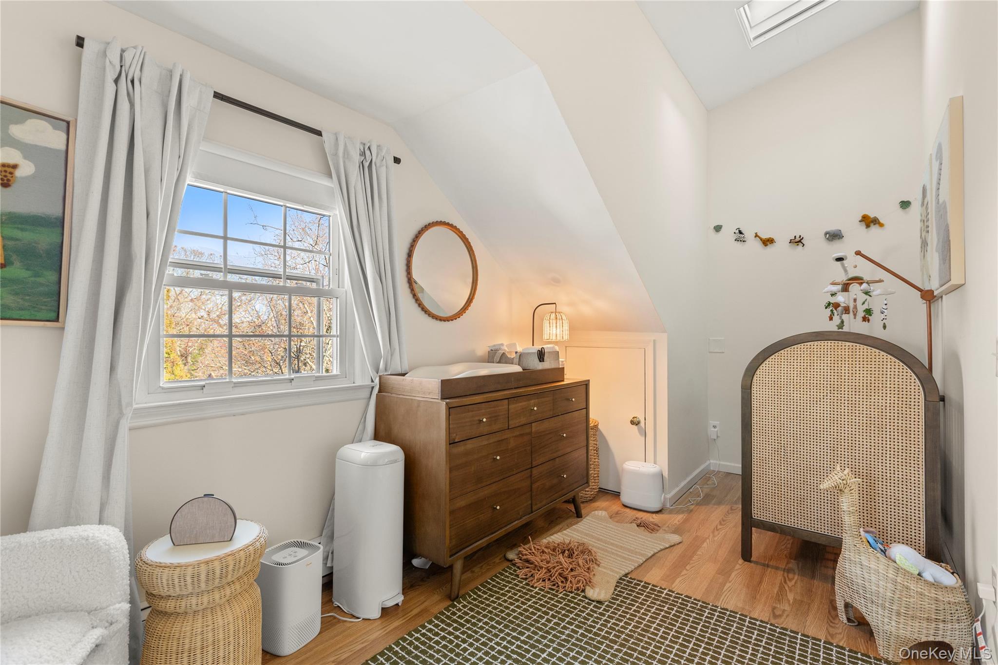1 Tarn Road Rocky Point, NY 11778 - Photo 17 of 25 a living room with furniture a window entryway and wooden floor