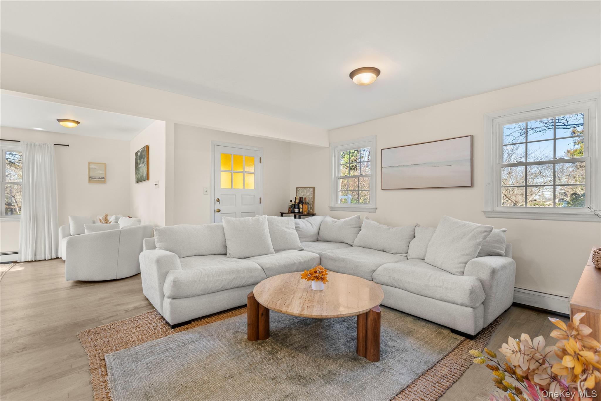 1 Tarn Road Rocky Point, NY 11778 - Photo 2 of 25 a living room with furniture and a large window