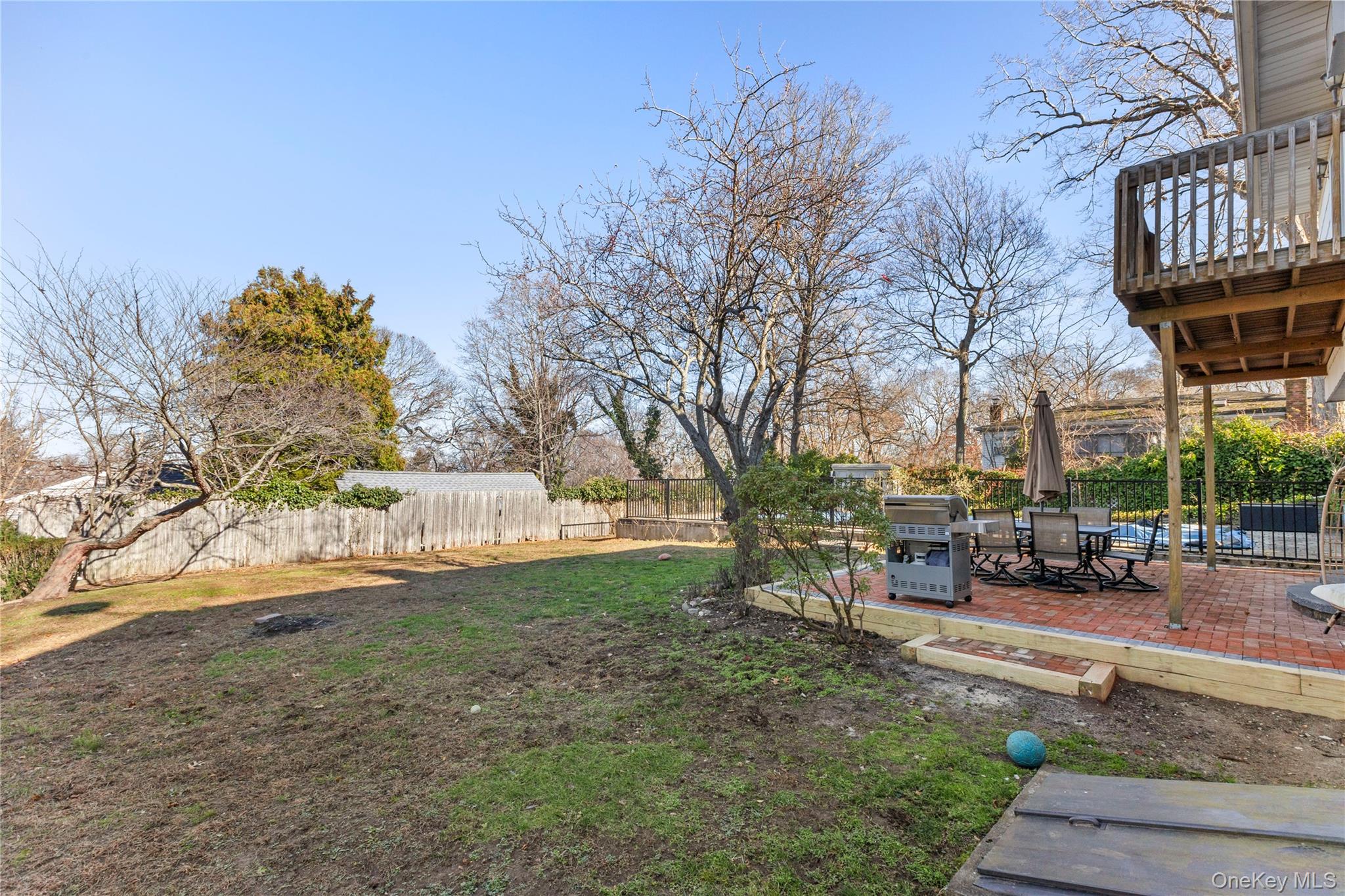 1 Tarn Road Rocky Point, NY 11778 - Photo 22 of 25 a view of a yard with a table and chairs