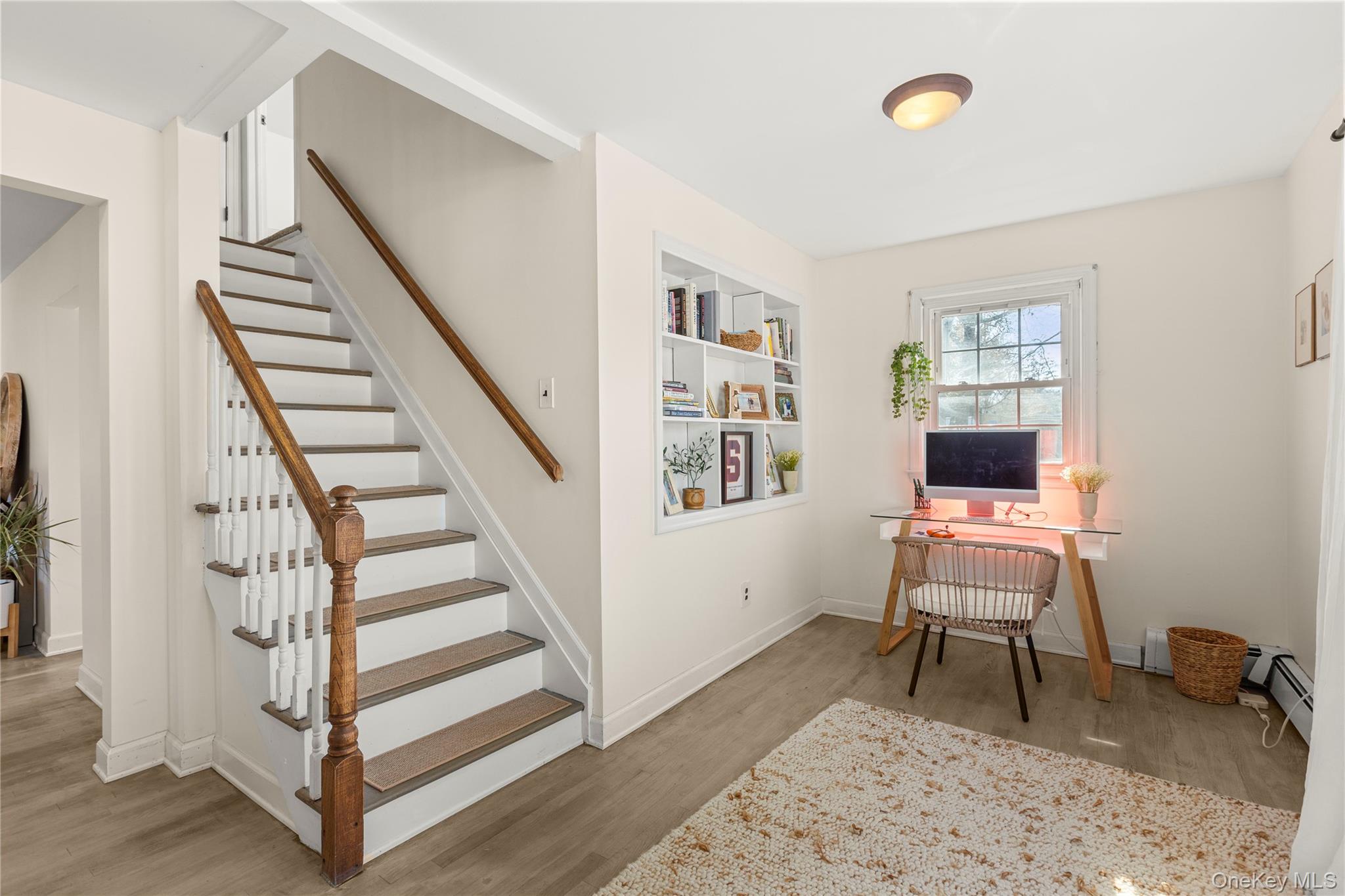1 Tarn Road Rocky Point, NY 11778 - Photo 9 of 25 a view of a livingroom with furniture and staircase