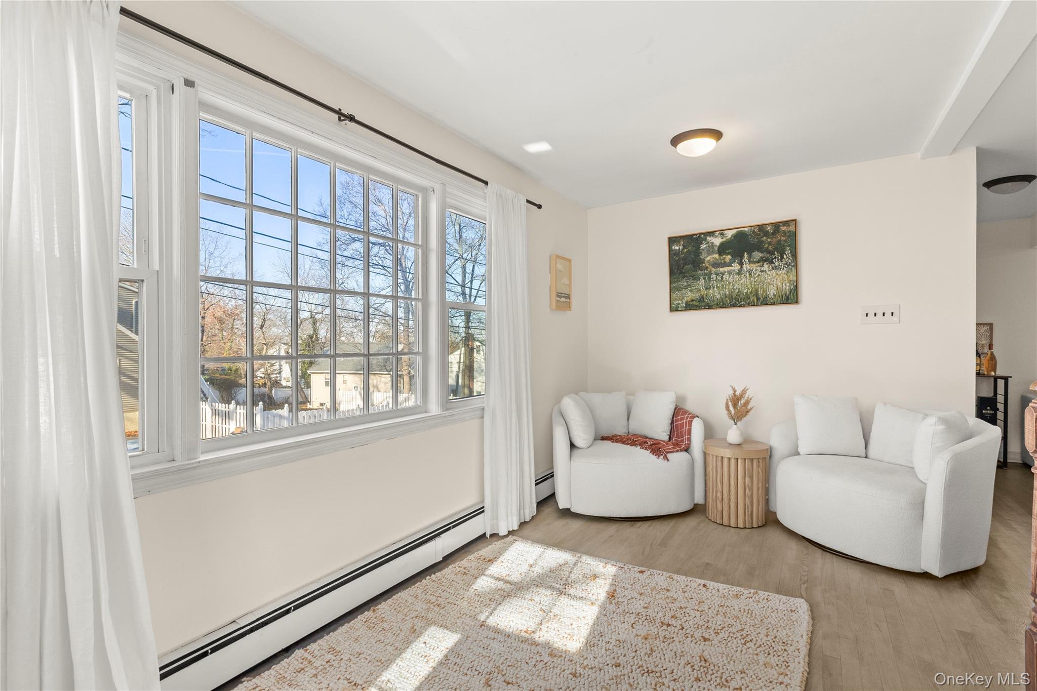 1 Tarn Road Rocky Point, NY 11778 - Photo 10 of 25 a living room with furniture and a window