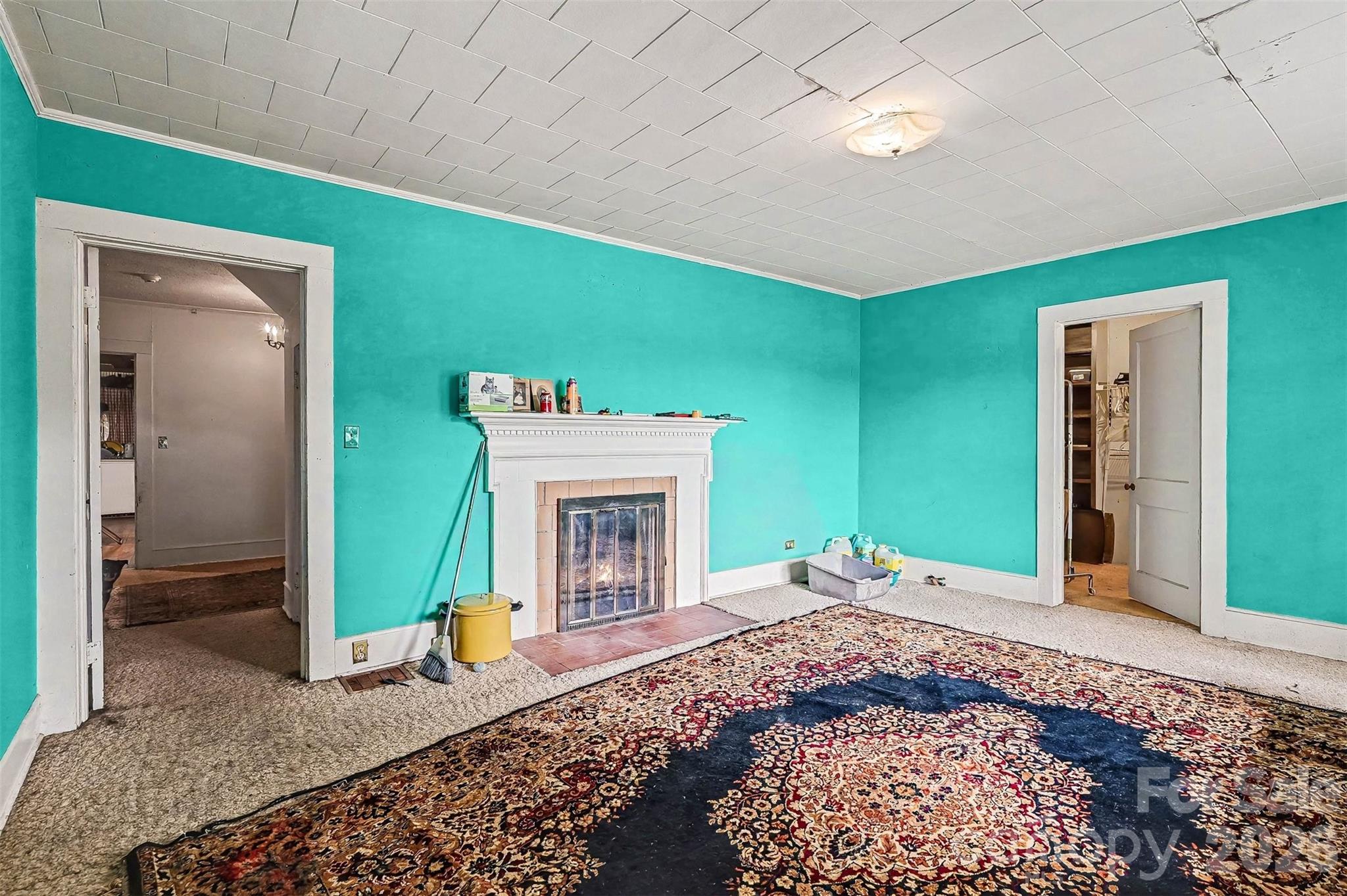 1116 Medlin Road Monroe, NC 28112 - Photo 16 of 40 a view of an empty room with a fireplace