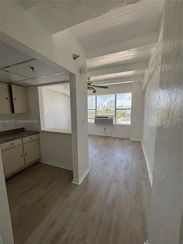 a view of a livingroom with a hard wood floor