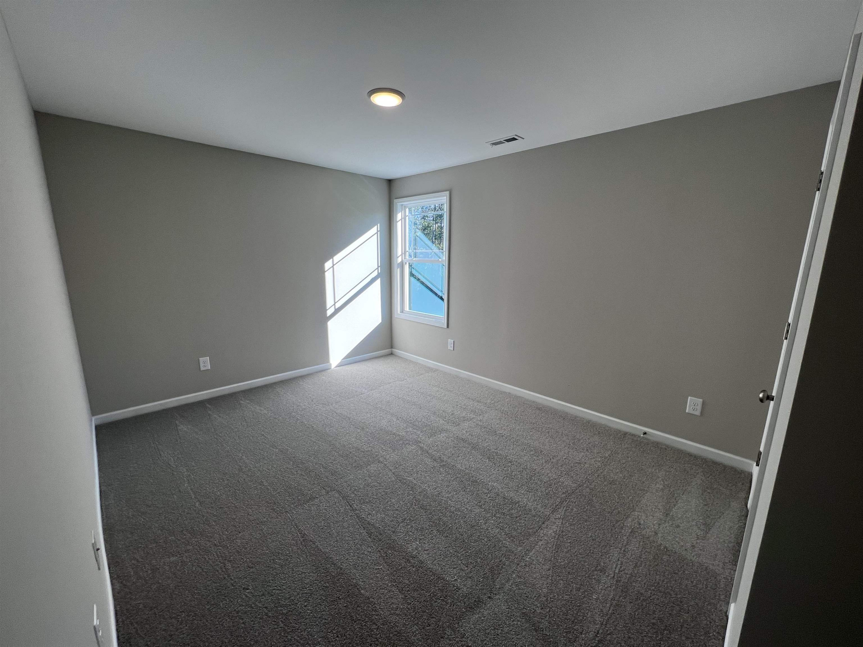 346 Touchdown Way Benson, NC 27504 - Photo 12 of 16 a view of an empty room