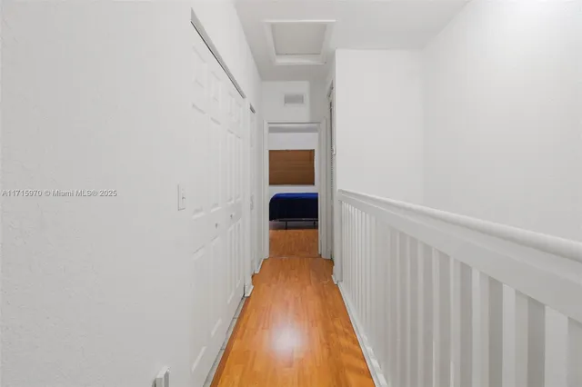 a view of a bathroom with a hallway