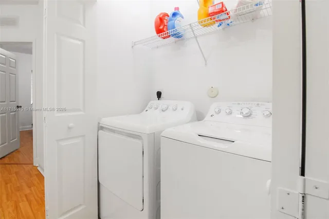 a utility room with dryer and washer